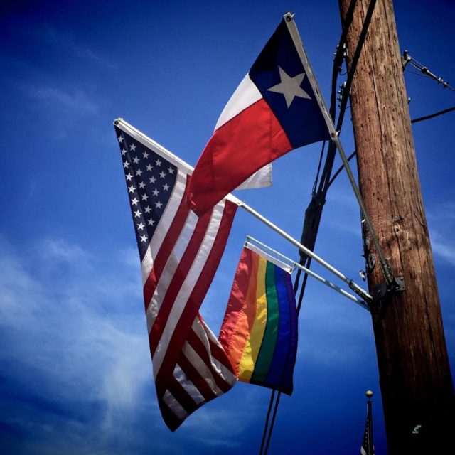 Texas American and Pride flags together