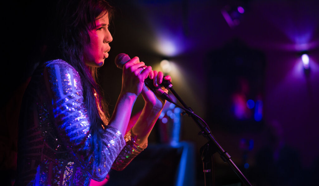 Woman performing on stage