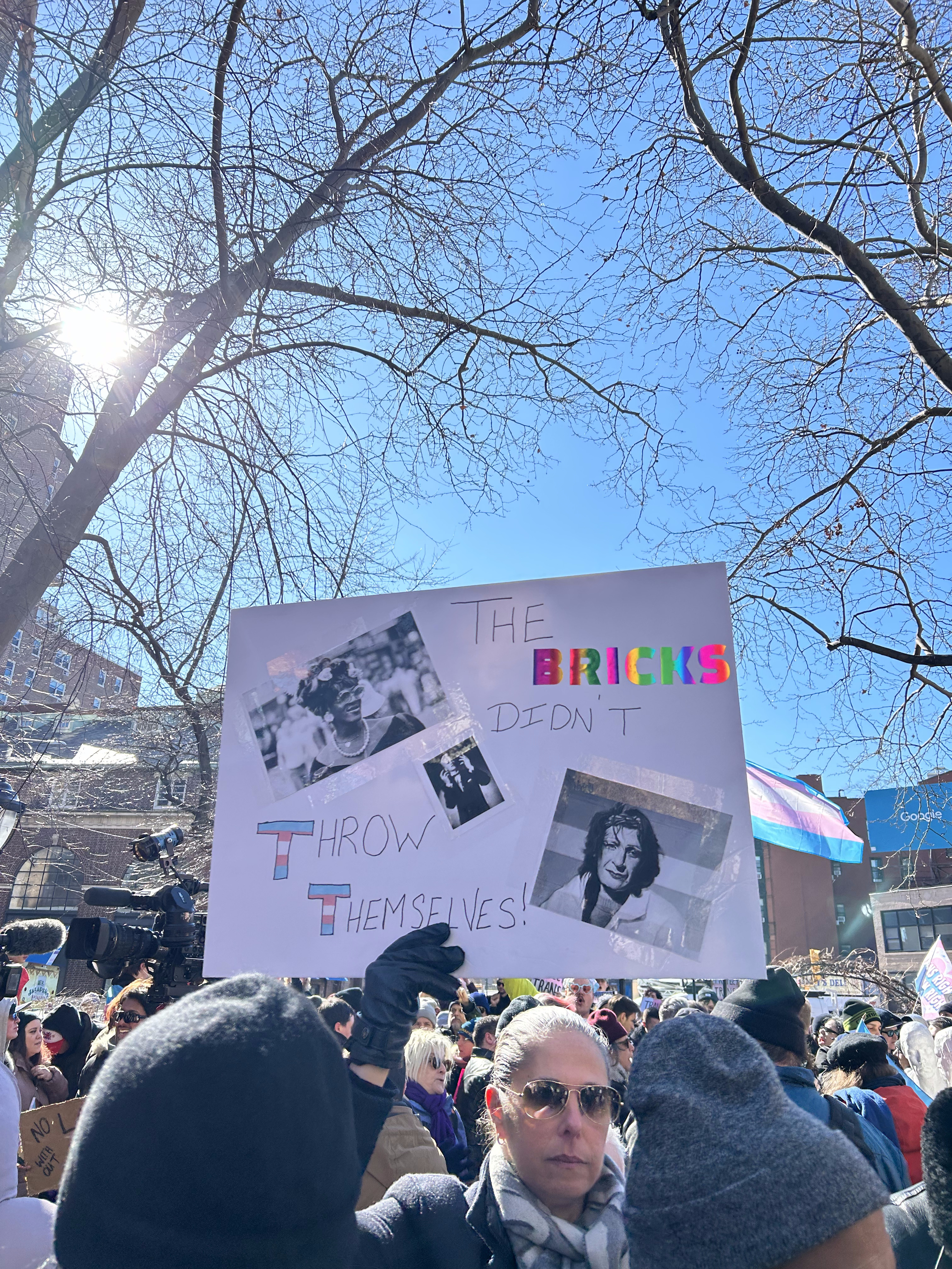 Protestor holds sign at Stonewall National Monument 2.14.2025