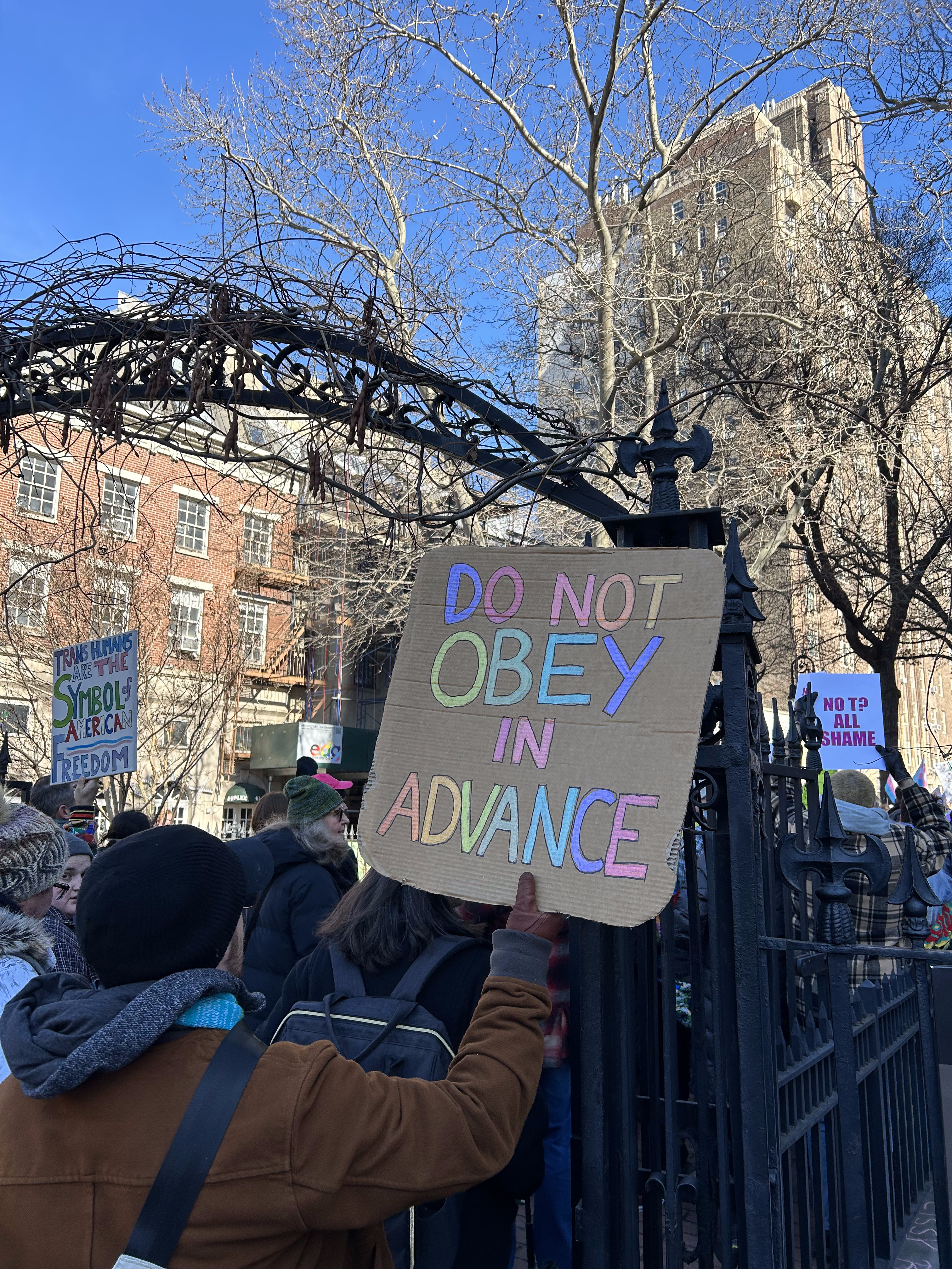 Protestor holds sign at Stonewall National Monument 2.14.2025