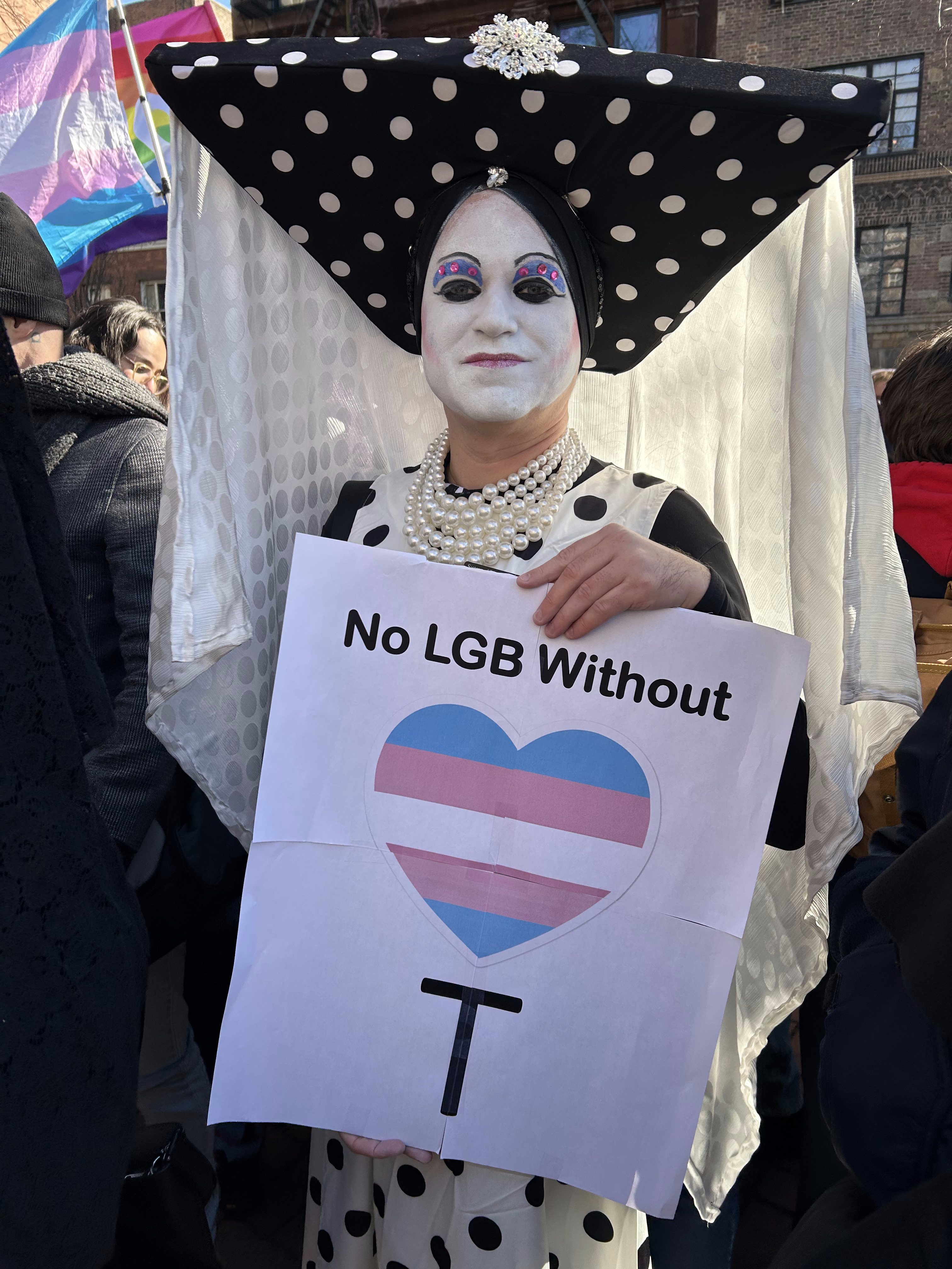 Protestor holds sign at Stonewall National Monument 2.14.2025