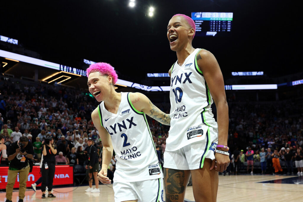 MINNEAPOLIS, MINNESOTA - AUGUST 08: Natisha Hiedeman #2 and Courtney Williams #10 of the Minnesota Lynx celebrate the win against the Washington Mystics after the game at Target Center on August 08, 2025 in Minneapolis, Minnesota. The Lynx defeated the Mystics 80-76. NOTE TO USER: User expressly acknowledges and agrees that, by downloading and or using this photograph, User is consenting to the terms and conditions of the Getty Images License Agreement. (Photo by David Berding/Getty Images)