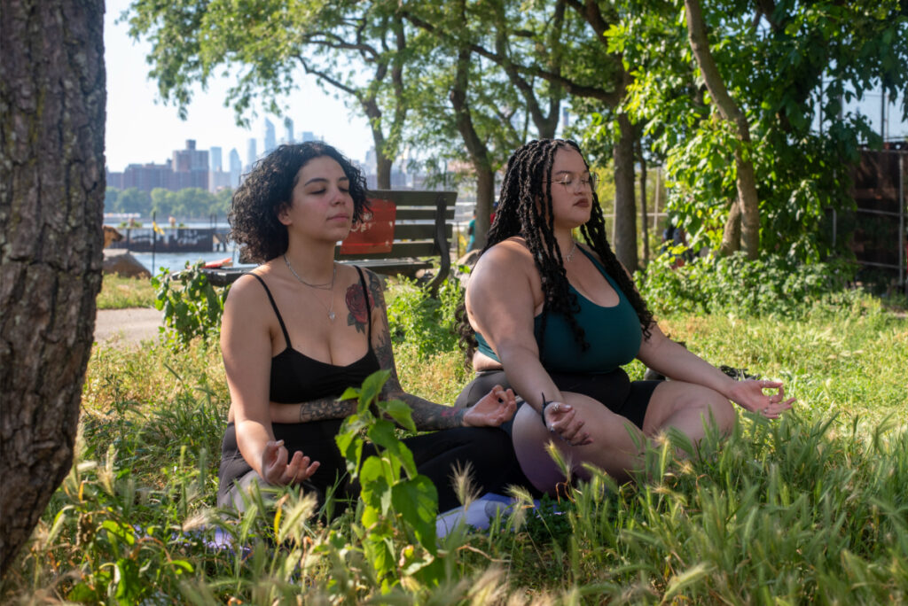lesbians meditate in the park